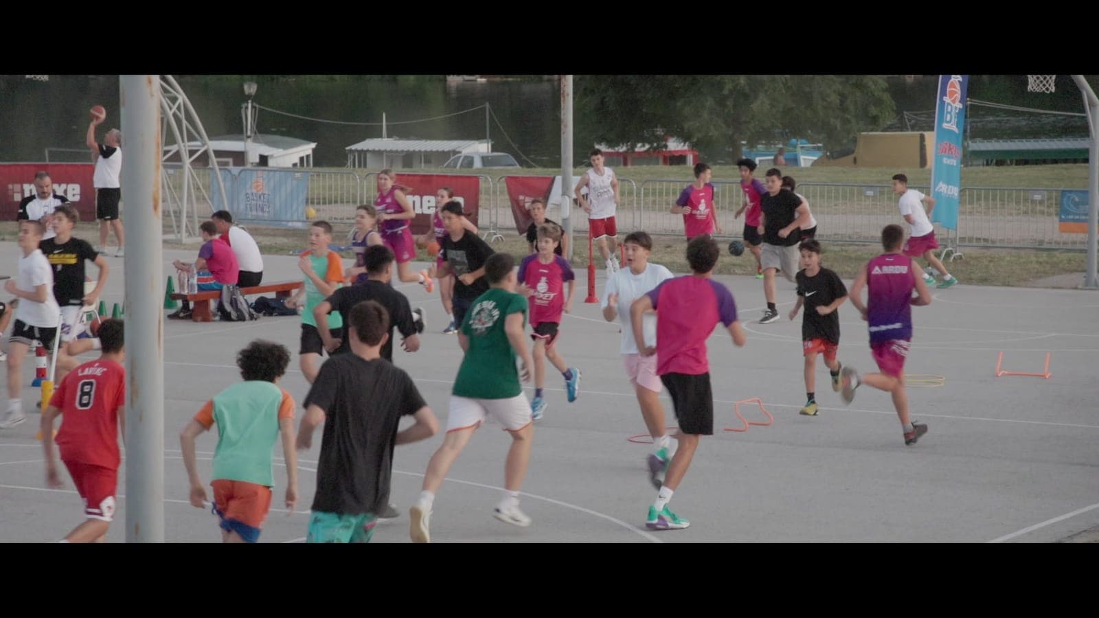 Young players training on the outdoor courts at Basket Friends camp in Novi Bečej